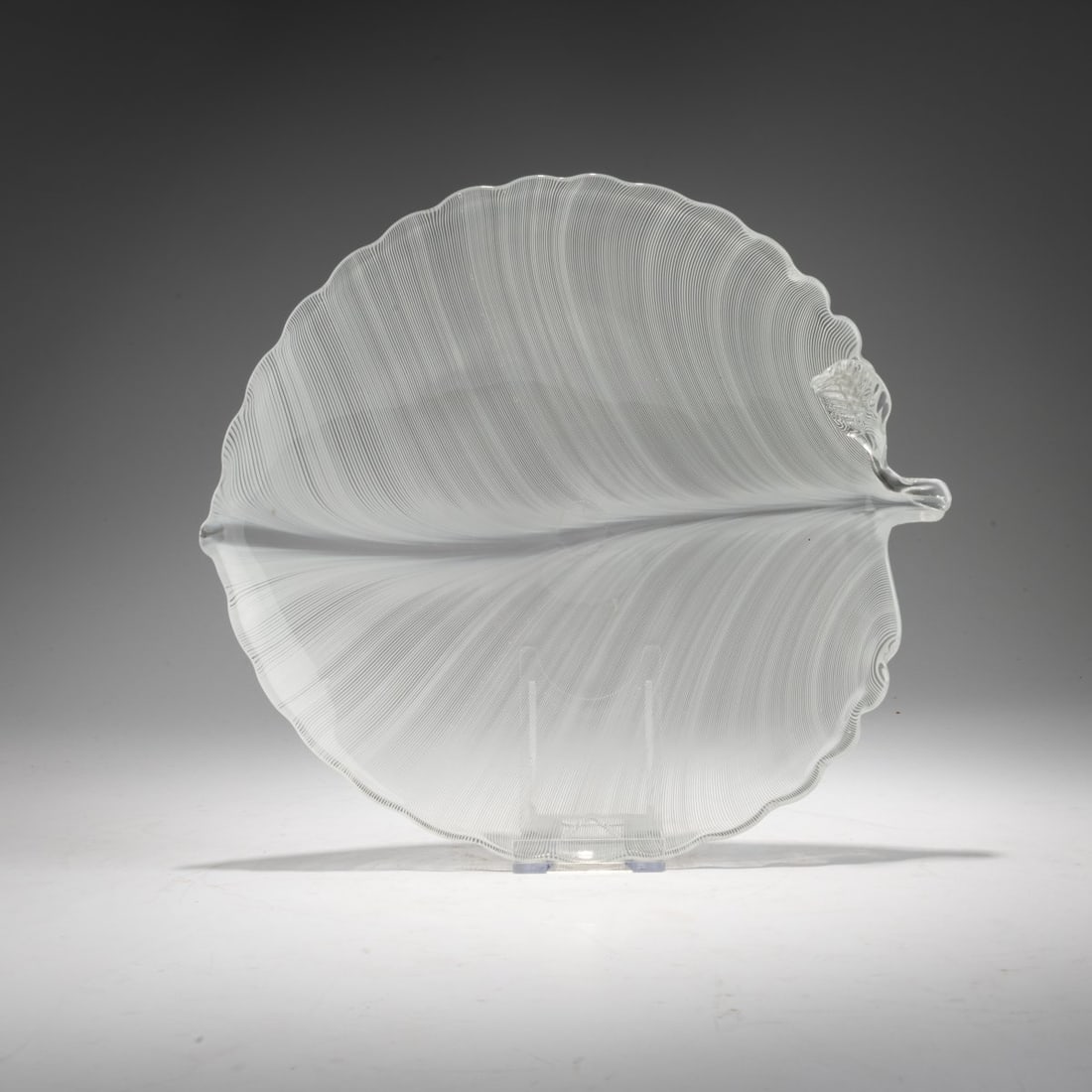 Tyra Lundgren, 'Lattimo Mezza Filigrana' Leaf-Shaped Bowl, 1938: <p>Model No. 2801. Execution: Venini. Colorless glass with white thread inlay. Marked on the base: venini murano ITALIA (acid