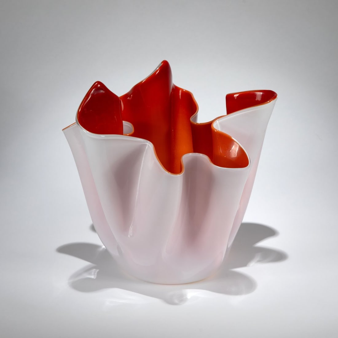 Fulvio Bianconi, 'Fazzoletto' vase, c. 1950: <p>H. 26 cm. Execution: Venini. Cased glass, colorless, orange-brown and white. Marked: venini murano ITALIA (acid stamp).</p>