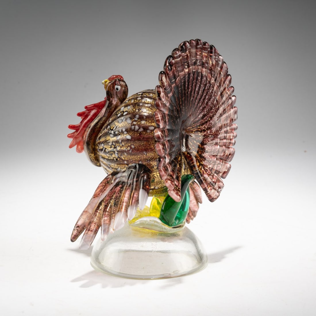 Emilio Nason, Turkey 'Tacchino', 1956: <p>H. 15 cm. Execution: A.Ve.M. Cased glass, colorless, white and green with violet and red spot inclusions and finely burst gold foil. </p><hr><p>Literature:</p><p>
