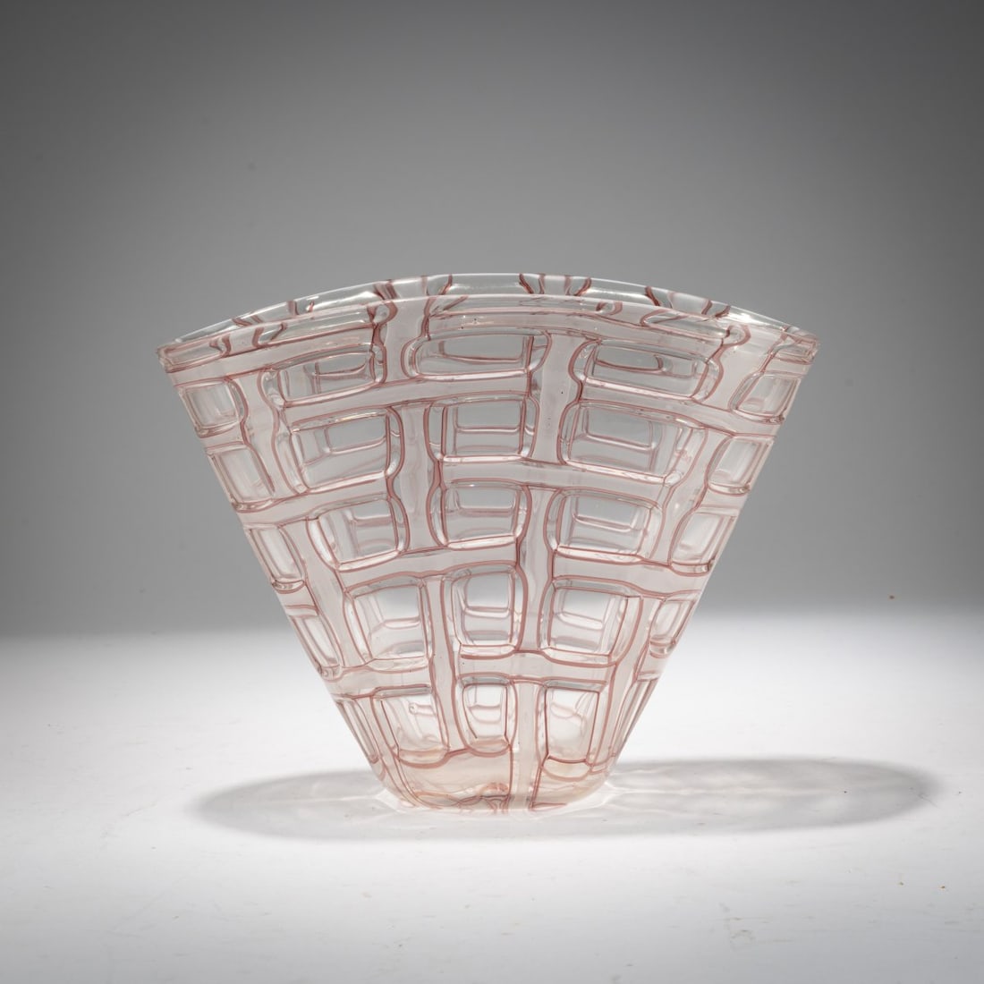 Ercole Barovier, 'Argo' vase, 1959: <p>H. 17.2 cm. Execution: Barovier &amp; Toso. Cased glass, colorless with grid-like fused bands of colorless and opaque white glass with a violet