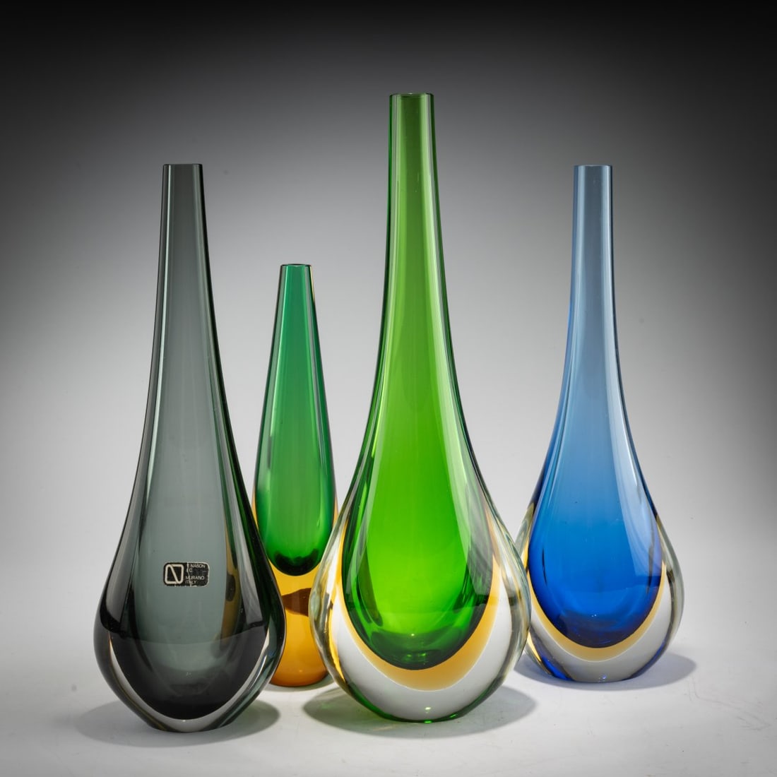 V. Nason & C. and Salviati & C., Four 'Sommerso' vases, 1960s: <p>H. 30&ndash;42 cm. Cased glass, colorless, blue, yellow, green, and gray. Two vases marked: manufacturer's label. </p>