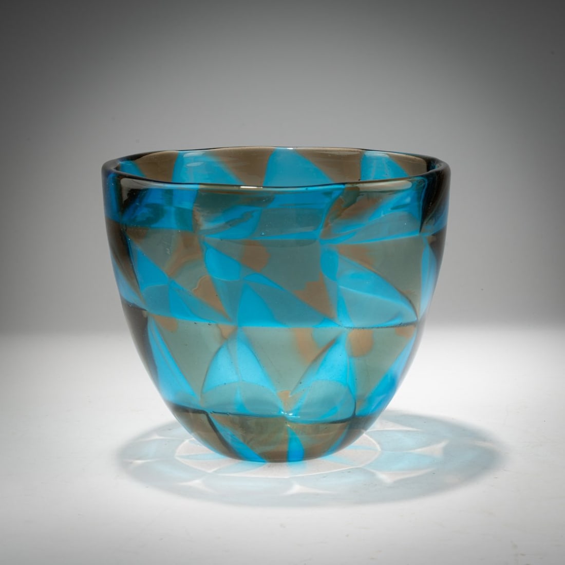 Ercole Barovier, 'Intarsio' vase, 1961-1963: <p>H. 15 cm. Execution: Barovier &amp; Toso. Colorless glass with fused triangular platelets in gray and turquoise. Marked on the base: Manufacturer's label.