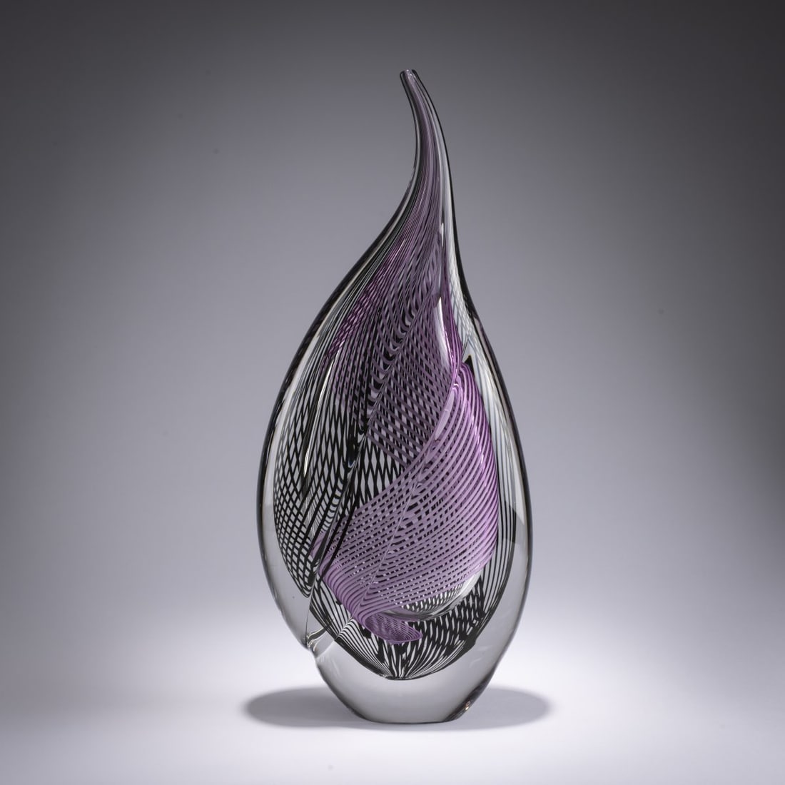 Lino Tagliapietra, Glass sculpture, 1996: <p>Cased glass, colorless, with fused threads in black and light purple. Marked on the base: Lino Tagliapietra 96 (engraved). </p>