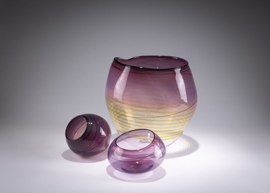 Dale Chihuly, Three 'Violet Basket' Bowls, 2010: <p>Large bowl, h. 26 cm; 25 x 23 cm. Cased glass, colorless, milky-purple layer, black and yellow threads. A small bowl marked: Chihuly PP10 (engraved).</p><hr><p>Literature:&l