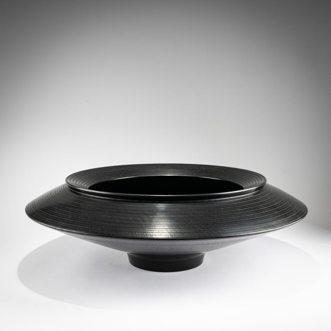 André von Mertens, Unique vessel 'Schwarzkeramik', 2011 (design): <p>H. 15 cm, &Oslash; 47 cm. <br />Clay, black glaze, beeswax. <br />Marked: Artist&rsquo;s signature (carved). </p>