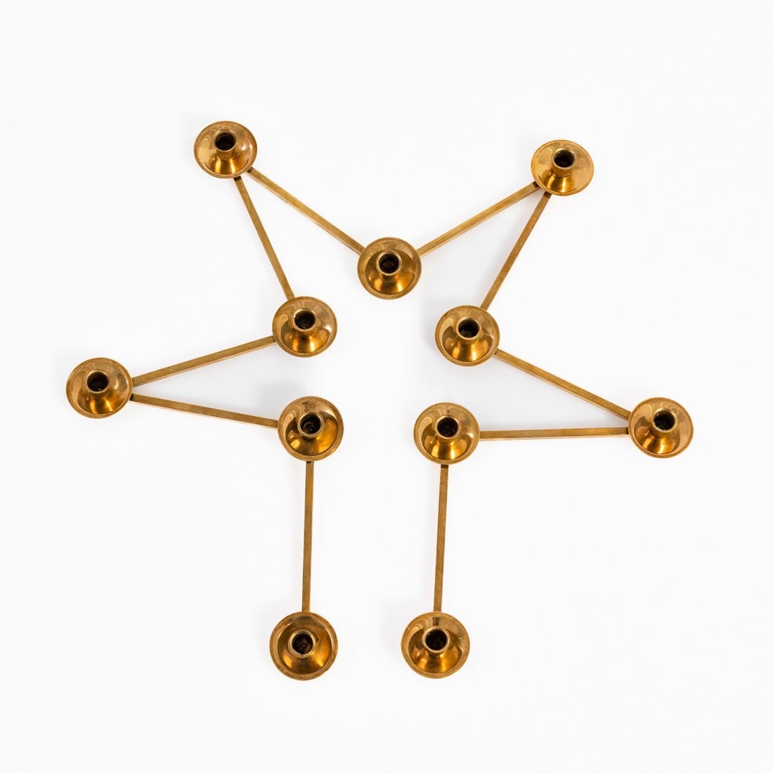 Lars Holmström, 'Margareta-Slingan' candleholder, 1960s (design): <p>H. 2 cm, L. max. 135 cm.<br />Arvika, Sweden.<br />Brass sheet and square bar.<br />Marked: 'MADE IN SWEDEN' (embossed).</p>