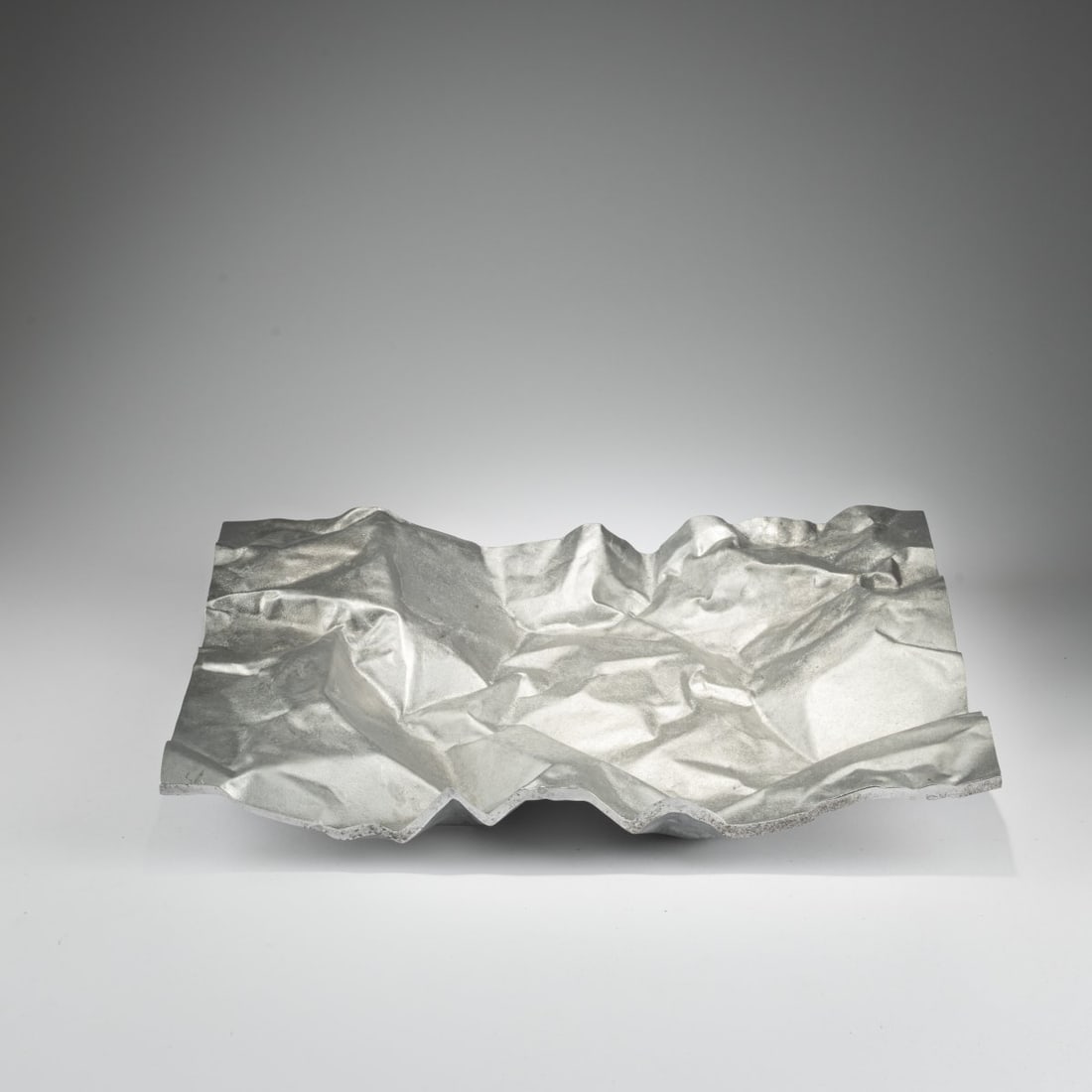 Giovanni Patuzzi; Nerone Ceccarelli , Bowl, 1970s/1980s (design): <p>H. 6.5 x 49.5 x 35.5 cm.<br />NP 2, Turin<br />Cast aluminum, matte finish.<br />Marked: Manufacturer's and designer's stamp.</p>