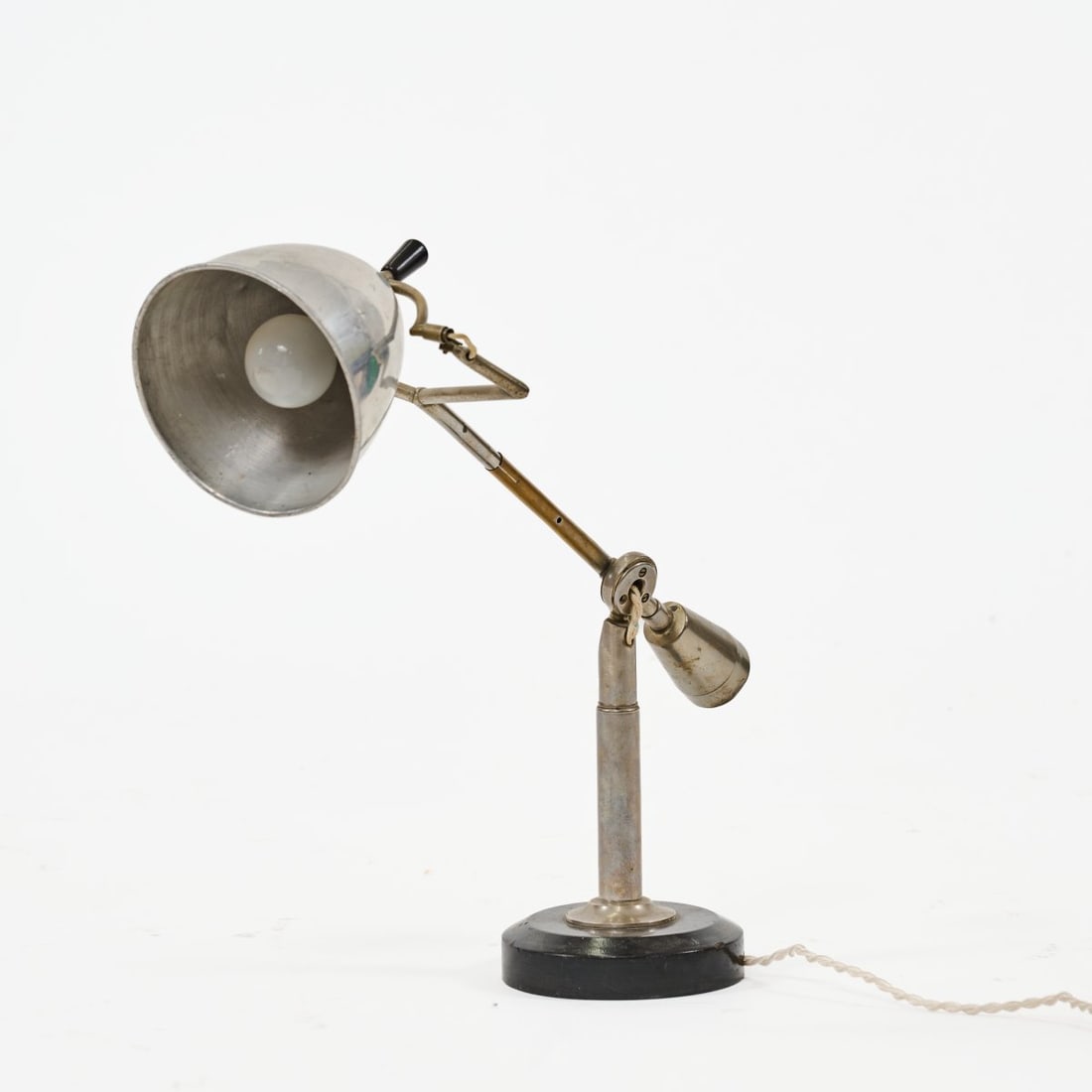 Edouard Wilfrid Buquet, 'Buquet' table light, 1927 (design): <p>H. max. 54 cm.<br />France, probably the 1980s or 1990s. <br />Metal tubing, copper-plated and nickel-plated; aluminum shade; wood, painted black.</p><hr><p>Lite