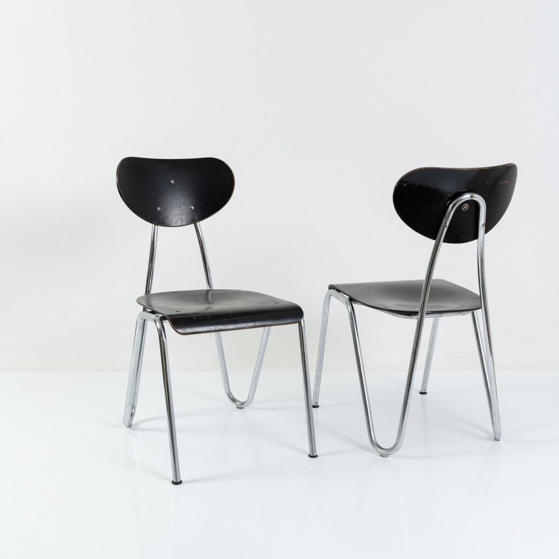 Karl Otto, Two chairs 'Arno', 1954 (design): <p>H. 80 x 37 x 42 cm. <br />L. &amp; C. Arnold, Stendal <br />Chrome-plated steel tubing, wood, black lacquer.</p>
