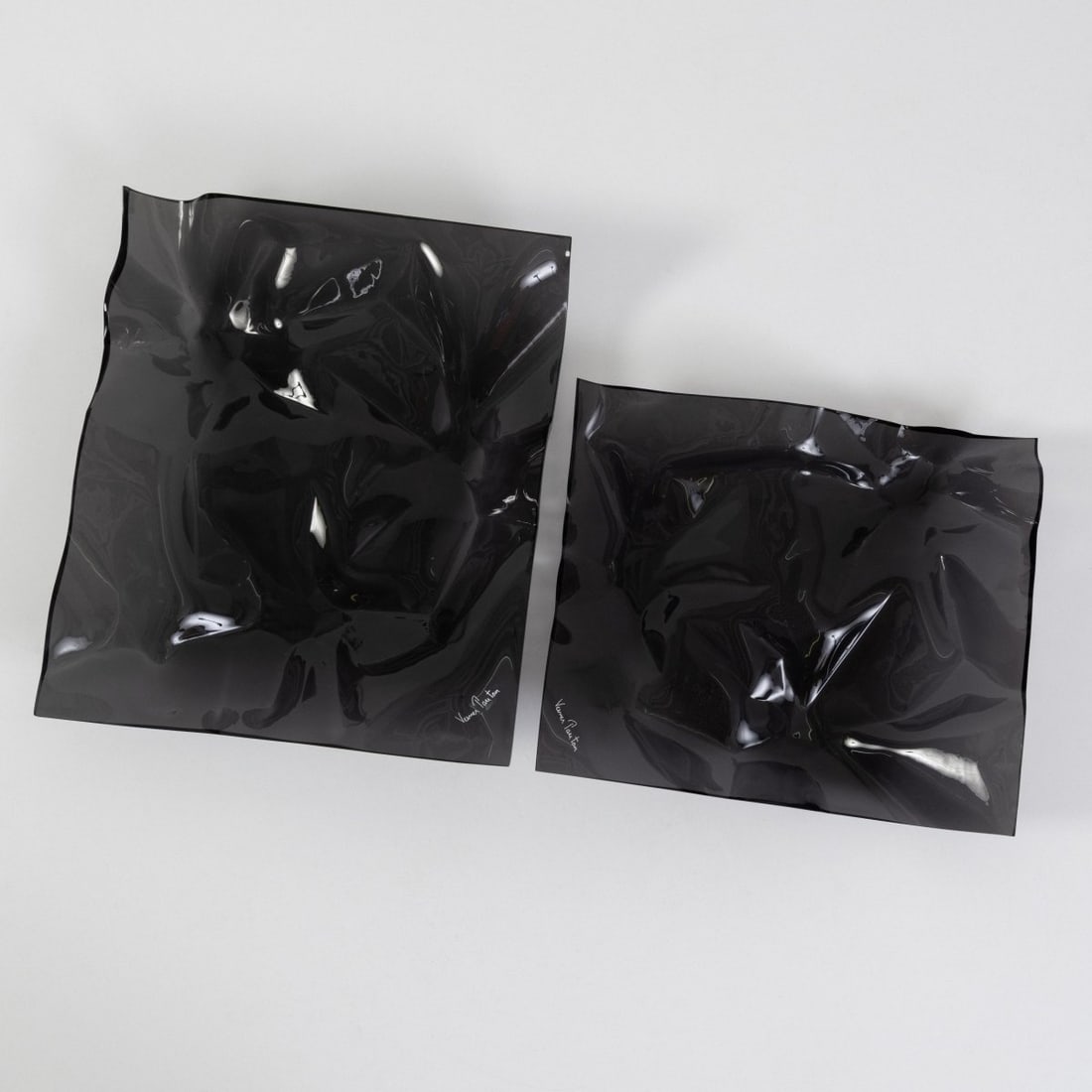 Verner Panton, Two fruit bowls, 1988 (design): <p>H. 10 x 44 x 38,5 cm, H. 10,5 x 51,5 x 44,5 cm.<br />Dansk Acryl Technik, Denmark. <br />Acrylic glass, black, vacuum-formed. <br />Marked: Facsimile signature. </p>&l