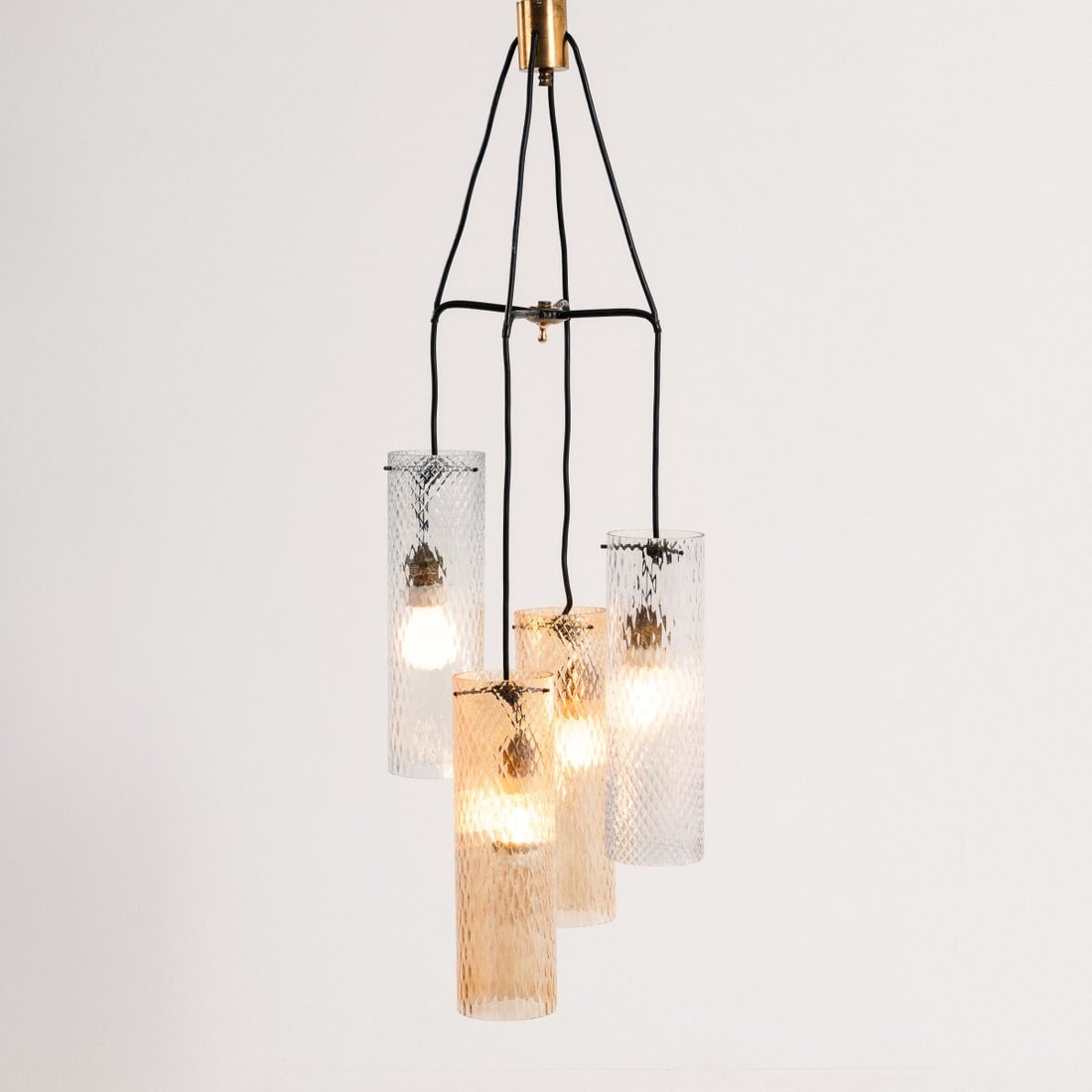 Stilnovo, Milan; Vistosi, Murano, Ceiling light, 1960s (design): <p>H. 100 cm, &Oslash; 36 cm.<br />Brass sheet, metal tubing, painted black, glass, clear and amber.</p>