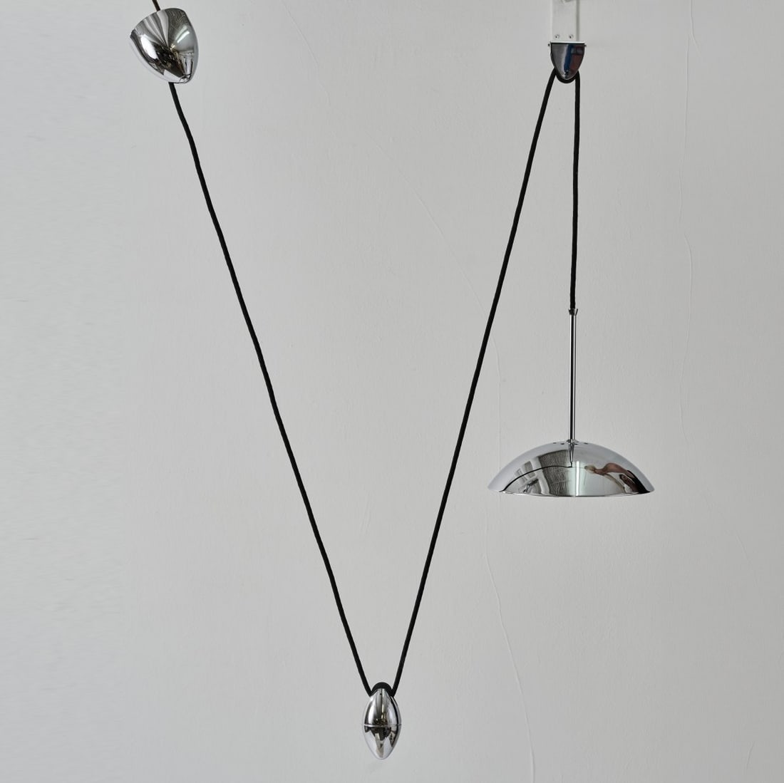 Florian Schulz, Wall light 'Era' and pendant light 'Duos', 1980s (design): <p>Era: H. 5.5 x 40 x 20 cm; Duos: &Oslash; 24.5 cm.<br />Schulz, Florian GmbH Licht und Objekt, Ludwigsburg.<br />Chrome-plated and white lacquered sheet metal, frosted glass,