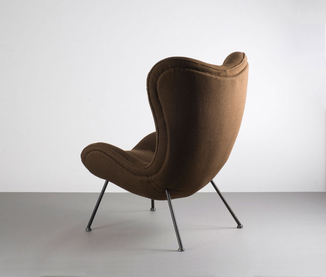 'Madame' easy chair: Fritz Neth. 'Madame' easy chair, 1950. H. 98.5 x 71.5 x 83 cm. Made by Correcta, Munich. Tubular steel, painted black, brown fabric.