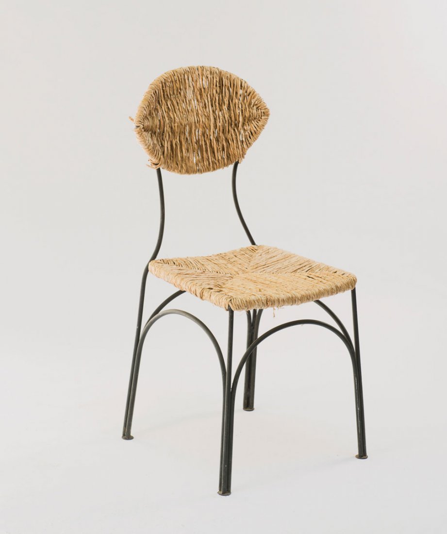 'Banana' chair: Tom Dixon. 'Banana chair', 1988. H. 93.5 x 40 x 47 cm. Made by Cappellini, Milan. Steel rods, reed work.