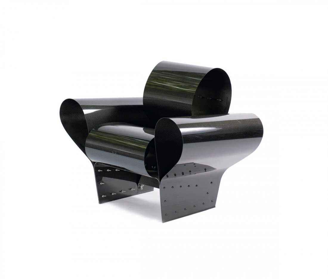 'Bad Tempered Chair': Ron Arad. 'Bad Tempered Chair', 2002. H. 82 x 101.5 x 75 cm. Made by Vitra Design, Weil am Rhein, c2004. Glass and carbon fibres, metal screws. Marked: Maker's label with reproduced designer's signatu