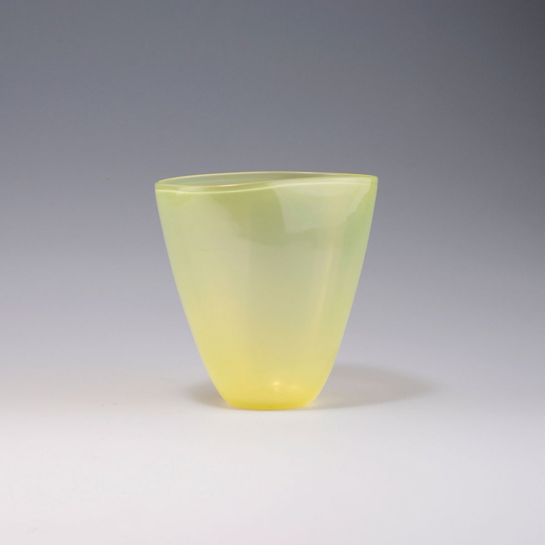 'Incamiciato' vase: Carlo Scarpa. 'Incamiciato' vase, c1935. H. 16 cm. Made by Venini & C. Cased glass, clear and lemon yellow, slightly iridescent. Marked: venini murano ITALIA (acid stamp).