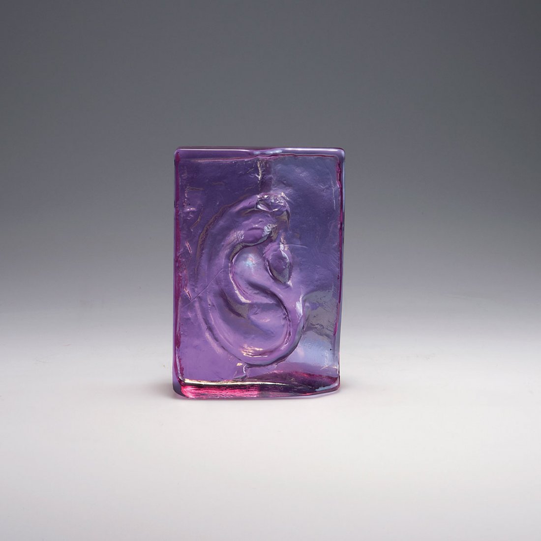 'Orecchio': Max Ernst (after). 'Orecchio', 1960s. 18 x 12 cm. Made by Fucina degli Angeli. Purple glass. Not signed.