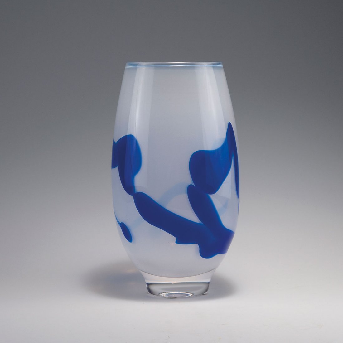 'Unica' vase: Andries Dirk Copier. 'Unica' vase, 1965. H. 30 cm. Made by Glasfabriek Leerdam. Cased glass, clear, milky white and dark blue. Marked: Leerdam Unica CK 155, A. D. Copier (diamond cut).
