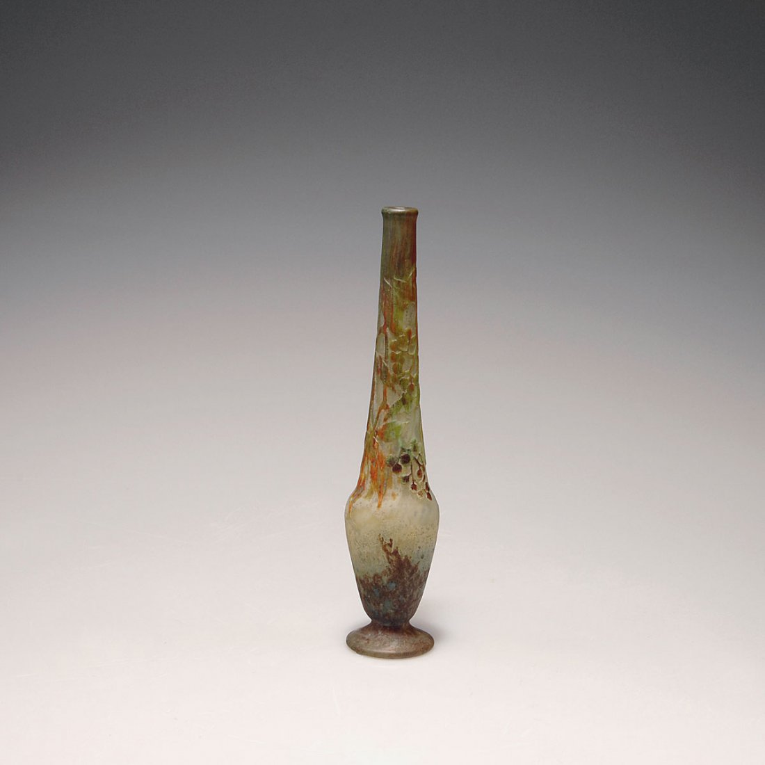Daum Freres, Nancy. 'Vigne vierge' vase, c1910. H. 19.5: Daum Freres, Nancy. 'Vigne vierge' vase, c1910. H. 19.5 cm. Cased glass, clear, milky yellow powder inclusions, green, orange, brown and dark red enamel fusions. Etched and worked with the wheel. Vine