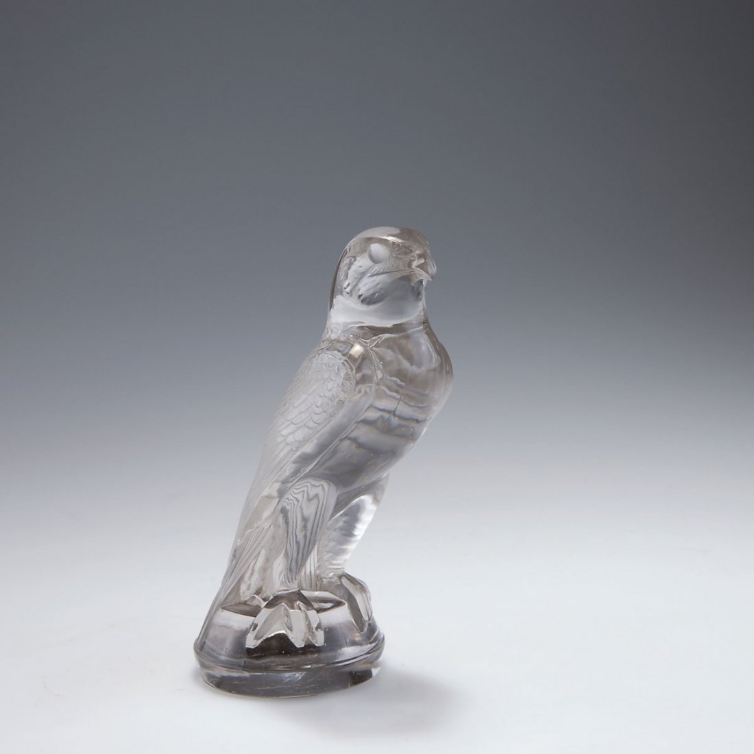 Rene Lalique, Wingen-sur-Moder. 'Faucon' radiator: Rene Lalique, Wingen-sur-Moder. 'Faucon' radiator maskot, 1925. H. 15.7 cm. Moulded clear glass, part matted. Marked: R. LALIQUE FRANCE (2x).