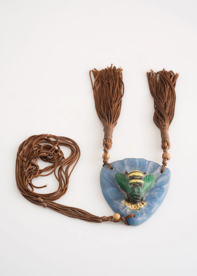 Amalric Walter, Nancy. 'Bumblebee' pendant, 1920s. 6.8: Amalric Walter, Nancy. 'Bumblebee' pendant, 1920s. 6.8 x 6.4 cm. Designed by Henri Berge. Pate de verre, translucid gather, moulded, mostly blue. Powder fusions, green, yellow and black. Signed: AWN,