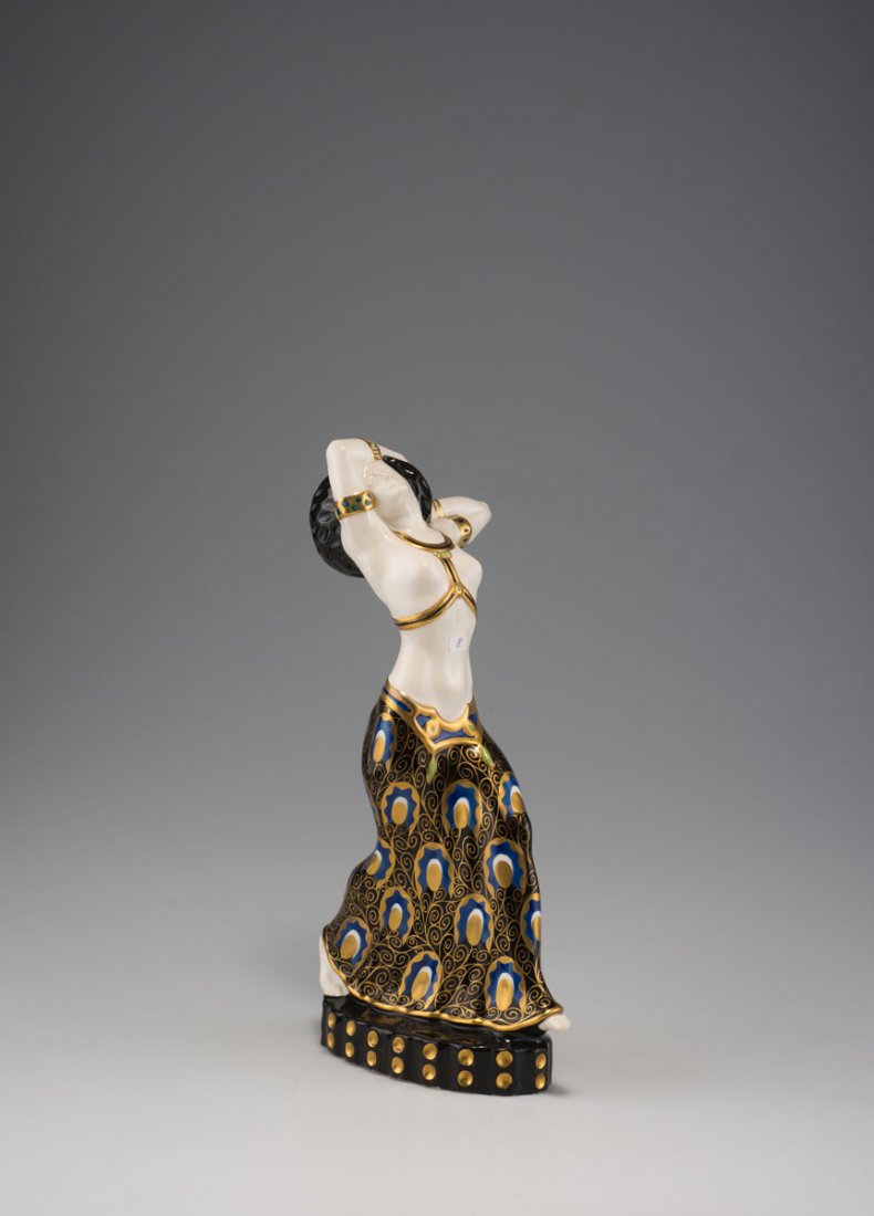 Ernst Wahliss, Wien & Turn-Teplitz. Dancer, c1912. H.: Ernst Wahliss, Wien & Turn-Teplitz. Dancer, c1912. H. 31.5 cm. Designed by Karl Klaus. Faience, polychromatic glaze with gold over white. Marked: Remains of an original label, 6, 1565, F. 1565, D. 894