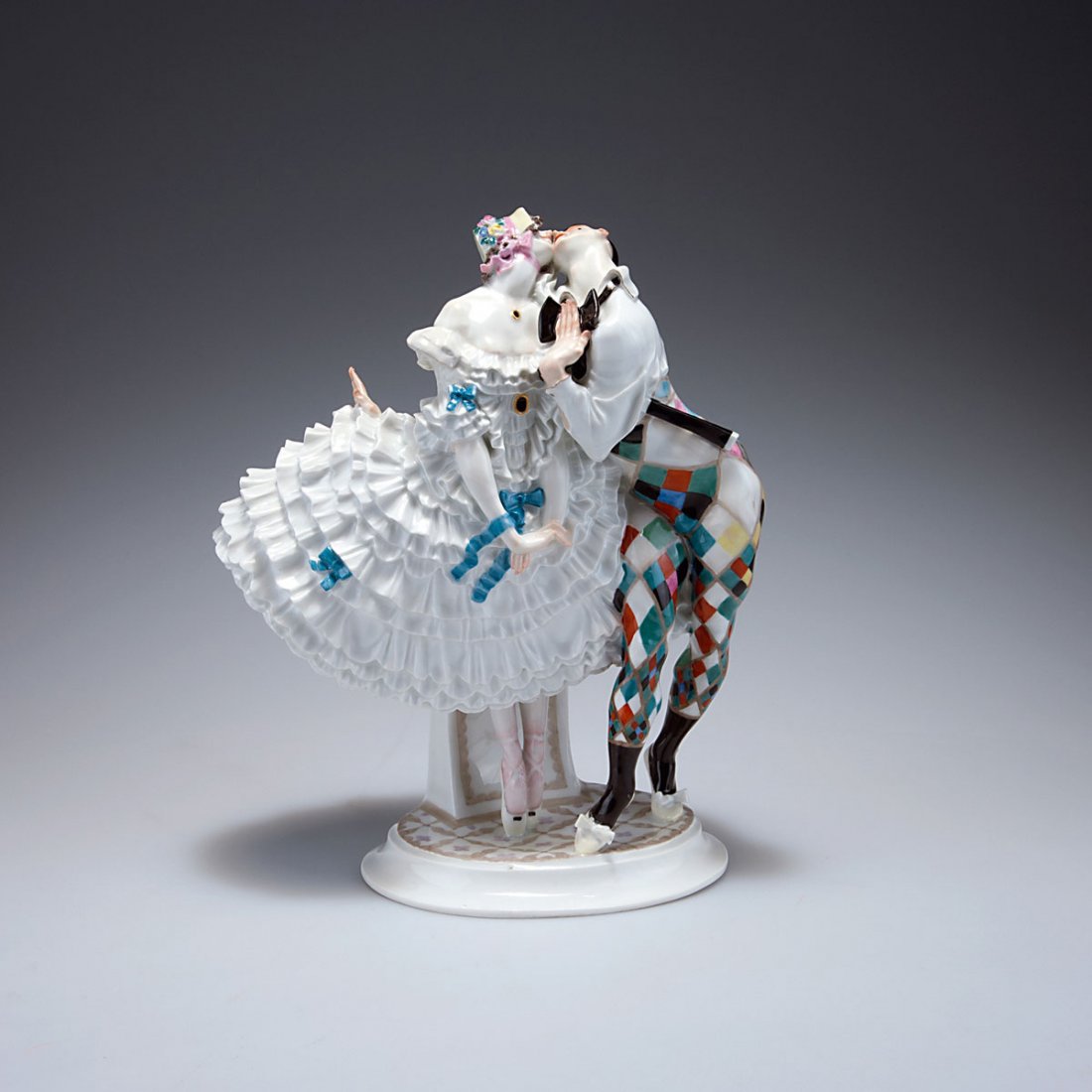 KPM Meissen. 'Harlequin and Columbine', 1914. H. 27 cm.: KPM Meissen. 'Harlequin and Columbine', 1914. H. 27 cm. Designed by Paul Scheurich. Made prior to 1924. Porcelain, white, glazed, polychromatic overglaze. Marked: Maker's mark, D. 287, 48.
