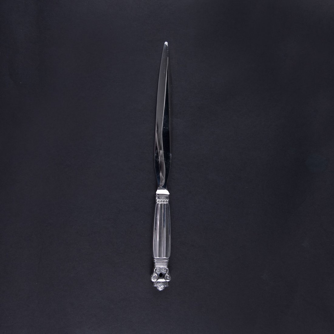 Georg Jensen, Copenhagen. 'Konge-Acorn' paper knife,: Georg Jensen, Copenhagen. 'Konge-Acorn' paper knife, 1915. L. 19.4 cm. Designed by Johan Rohde. Silver, acorn pattern. Marked: GEORG JENSEN, STERLING DENMARK.