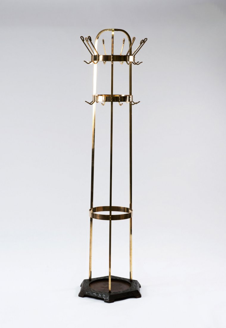 Vienna (attributed). Coat rack, c1900. H. 195 cm; D. 53: Vienna (attributed). Coat rack, c1900. H. 195 cm; D. 53 cm. Tubular brass, sheet brass, cast iron, black, sheet metal.