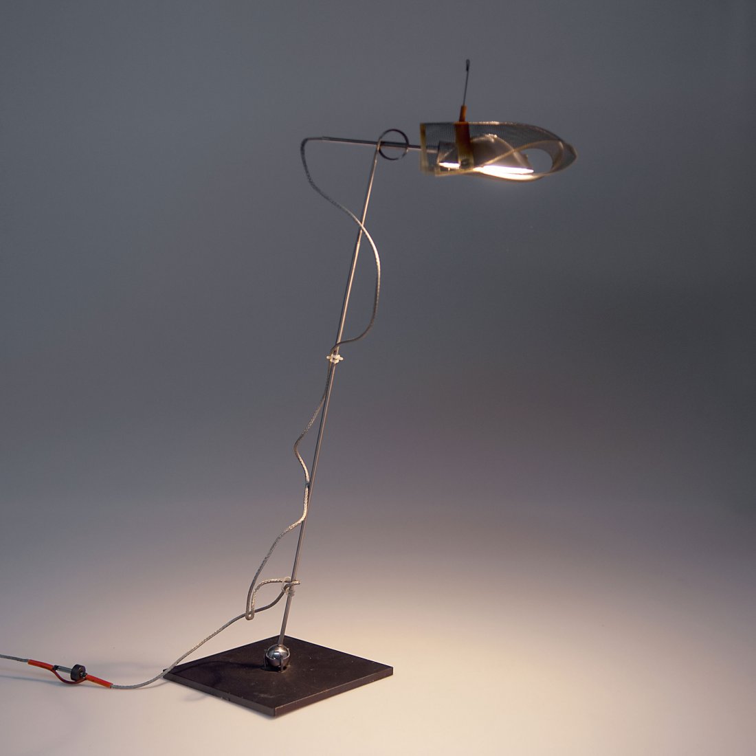 Ingo Maurer & Team. 'Los Minimalos uno' table light,: Ingo Maurer & Team. 'Los Minimalos uno' table light, 1994. H. 52 x 13.2 x 11 cm. Made by Design M, Ingo Maurer, Munich. Stainless steel, steel fabric, aluminium, halogen lamp.