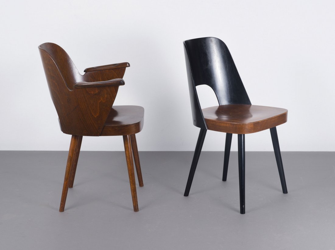 Oswald Haerdtl (attributed). Chair and armchair, c1950.: Oswald Haerdtl (attributed). Chair and armchair, c1950. Armchair: H. 82 x 62 x 53 cm; chair: H. 83 x 44 x 52.5 cm. Made by Ton, Czech Republic. Beech wood and plywood, part black. Marked: remains of a