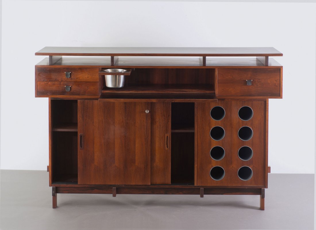 Arne Vodder (attributed). Liquor cabinet, c1958. H. 118: Arne Vodder (attributed). Liquor cabinet, c1958. H. 118 x 179 x 51 cm. Made by Dyrlund A/S, Rude. Wooden construction, rosewood veneer. Marked: Maker's label.