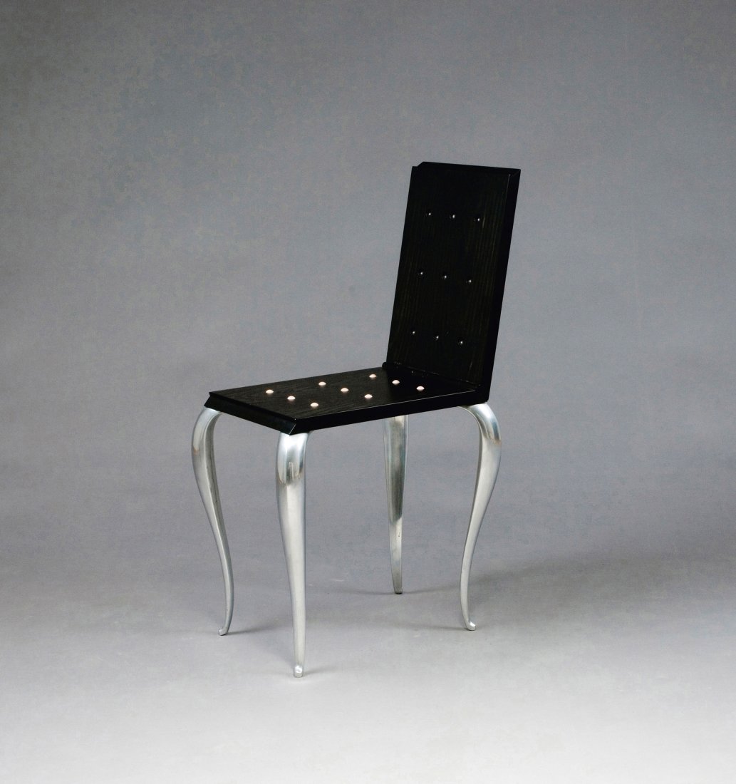 Philippe Starck. 'Lola Mundo' folding chair, 1988. H.: Philippe Starck. 'Lola Mundo' folding chair, 1988. H. 85 x 34 x 52 cm; as stool: H. 49 x 34 x 53 cm. Made by Driade, Piacenza. Aluminium, ebonised ashwood, black chrome-plated steel, rubber nails.