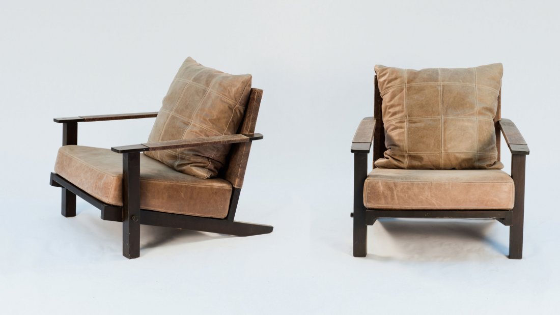 Gilles Caffier. Pair of armchairs, 1990s. H. 80 x 80 x: Gilles Caffier. Pair of armchairs, 1990s. H. 80 x 80 x 86 cm. Beechwood, stained dark, brown leather.