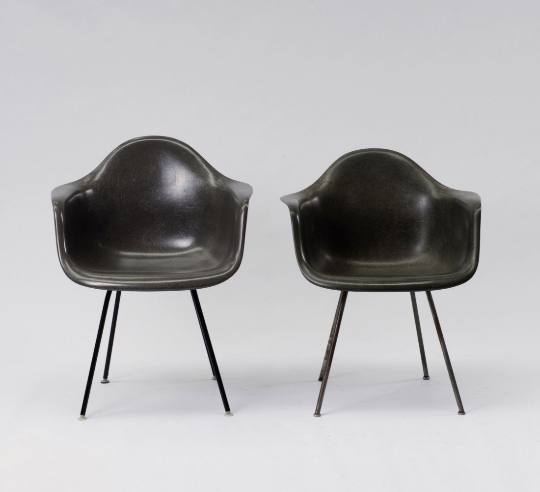 Charles Eames. Two 'plastic armchairs', 1950-53. H. 80: Charles Eames. Two 'plastic armchairs', 1950-53. H. 80 x 63 x 59 cm; H. 75 x 63 x 61 cm. Made by Herman Miller, Zeeland and Zenith Plastics, Gardena. Tubular steel, painted black, steel rods, chrome-p