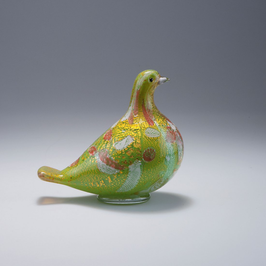 Giulio Radi. Dove, c1958. H. 18.5 cm. Made by A.Ve.M.: Giulio Radi. Dove, c1958. H. 18.5 cm. Made by A.Ve.M. Clear cased glass, green layer. Included silver and copper foils, fused murrhines, clear glass with white webbing.
