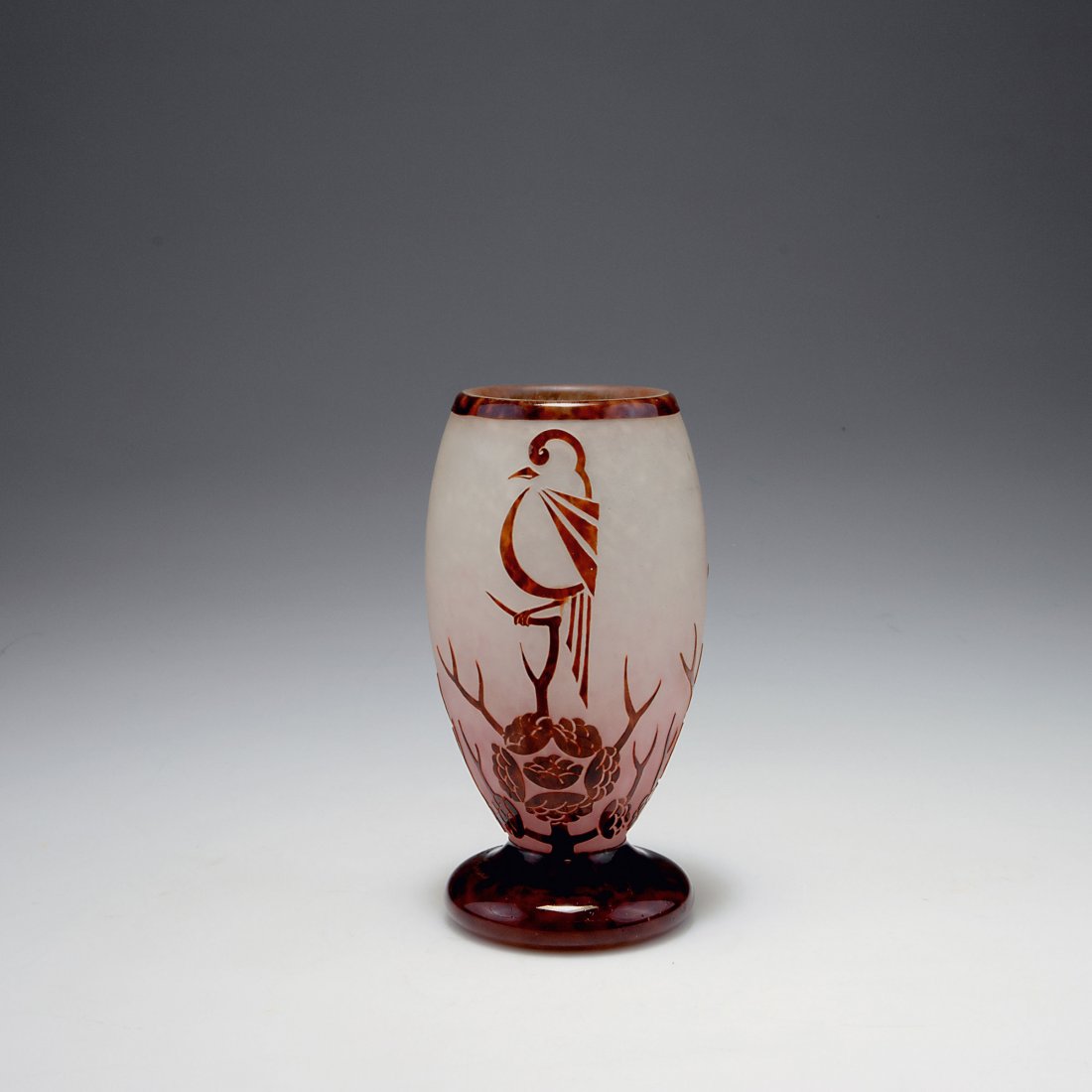 'Pinsons' vase: Schneider, Epinay-sur-Seine. 'Pinsons' vase, 1927-29. H. 17.8 cm. Cased glass, clear, pink and milky white powder inclusions, auburn enamel fusions. Multiply etched pattern with finches sitting on bra