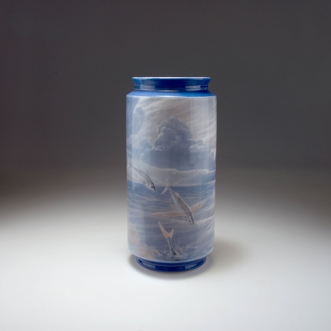 Unicum vase with fish and jellyfish: Royal Copenahgen. Unicum vase with fish jellyfish, 1890. H. 34.8 cm. Shape designed by Arnold Krog. Painting by Gerhard Heilmann. Porcelain, white, glazed, underglaze, pale and dark blue and grey. Sea