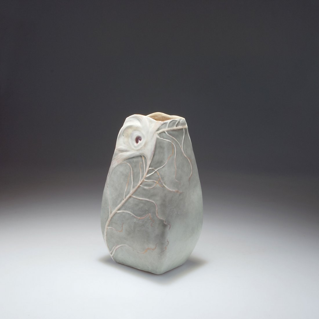 Vase with peacock feathers: Clement Massier, Golfe-Juan. Vase with peacock feather, 1890-95. H. 26.2 cm. Earthenware, glazed matt grey, pale pink and white, gold wash. Marked: MC Gofe-Juan.