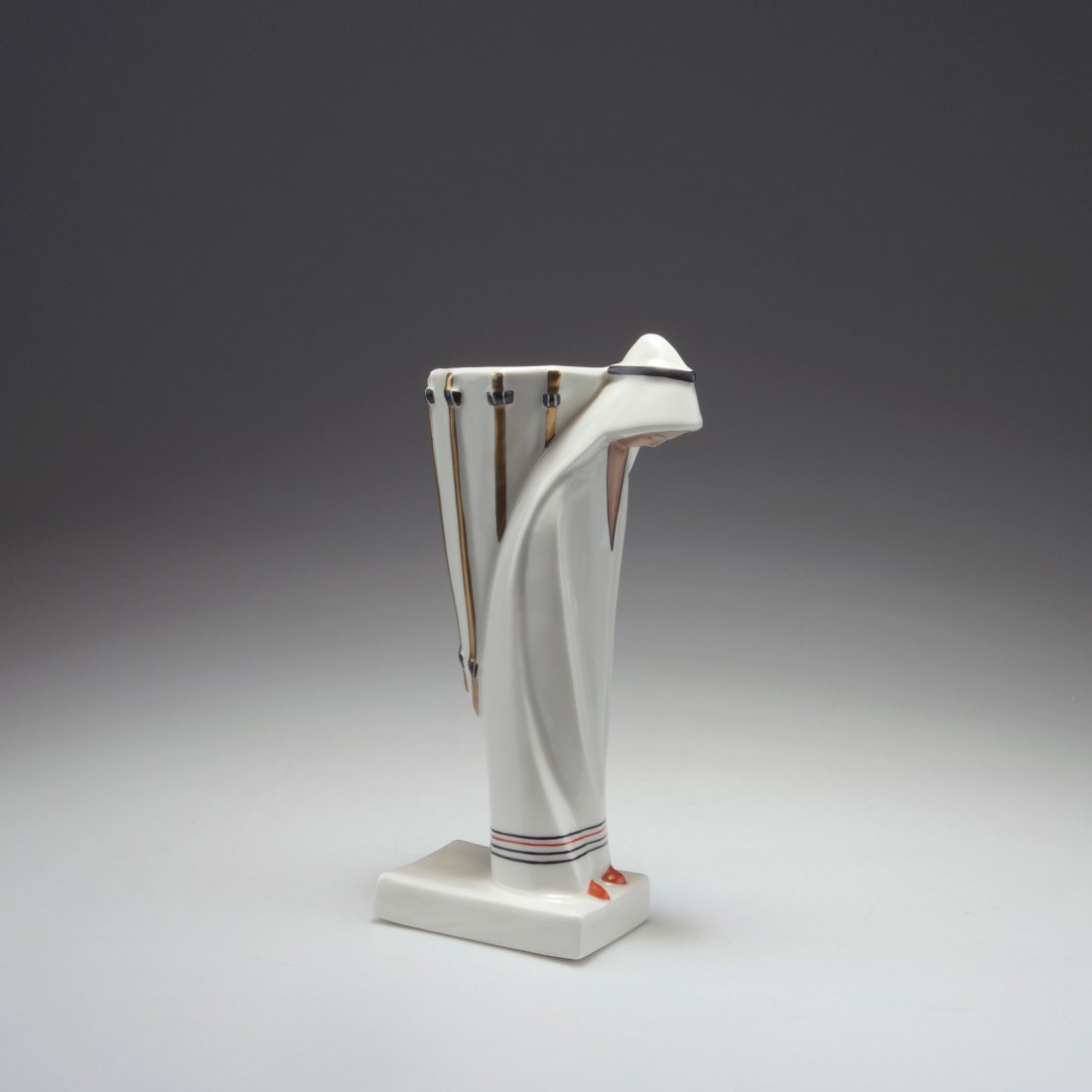 'Oriental woman' vase: Robj (Jean Born), Paris. 'Oriental woman' figurative vase, c1928. H. 22 cm. Earthenware, glazed black, orange and pink on white. Gold. Marked: ROBJ PARIS Made in France, A. de Coil(...).