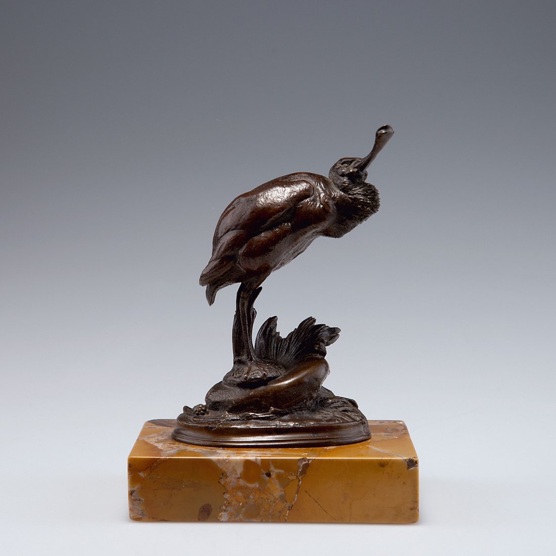 Common spoonbill: Auguste Nicolas Cain. Common spoonbill, c1870. H. 13.5 cm (incl. base). Bronze, dark patina, brown yellow marble base. Marked: CAIN.