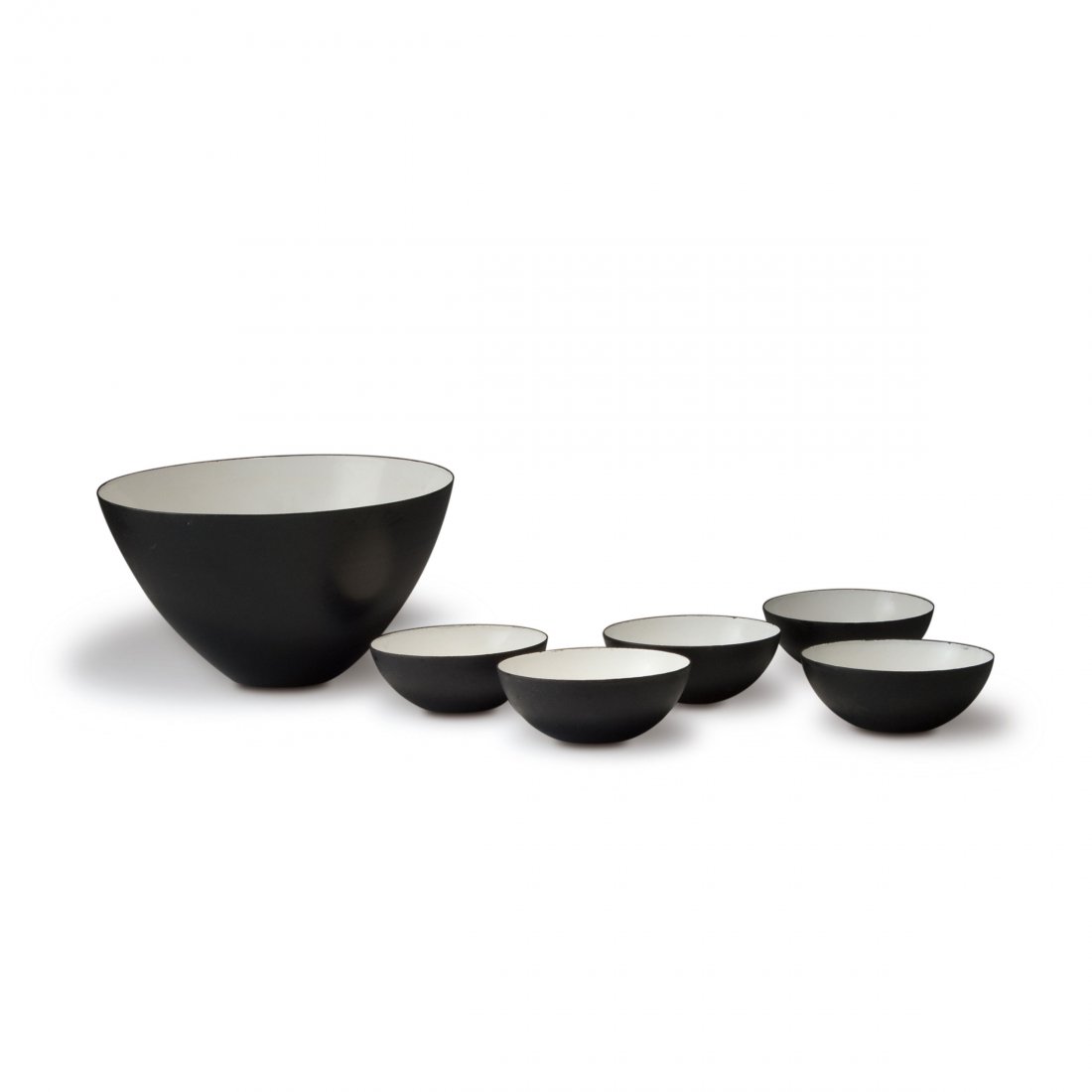 Herbert Krenchel. Six 'Krenit' bowls, c1953. H. 4.7 cm;: Herbert Krenchel. Six 'Krenit' bowls, c1953. H. 4.7 cm; D. 12 cm; H. 14.2 cm; D. 25,3 cm. Made by Torben orskov & Co., Copenhagen. Sheet steel, outside matt black, enamelled white inside.