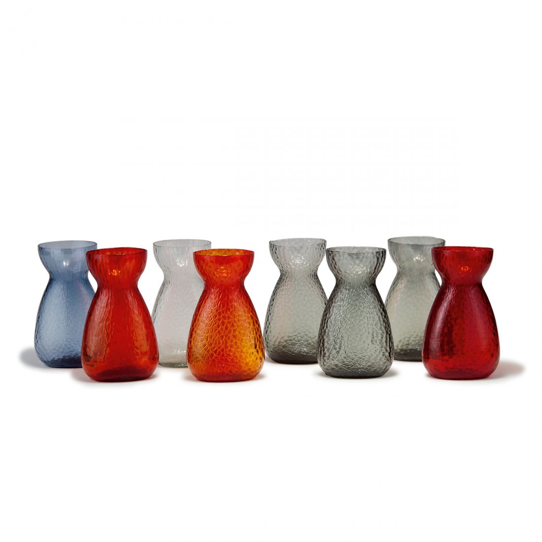 Holmegaard Glasvaerk, Copenhagen. Eight vases, 1960s.: Holmegaard Glasvaerk, Copenhagen. Eight vases, 1960s. H. 14.6 cm. Moulded glass, red, smoke blue and smoke grey.