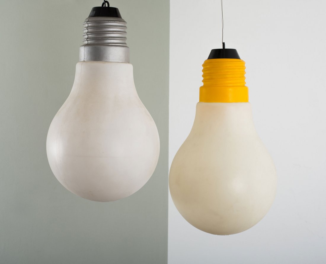 Ingo Maurer. Pair of 'Bulb Bulb' pendant lights, 1980.: Ingo Maurer. Pair of 'Bulb Bulb' pendant lights, 1980. H. 58-60 cm. Made by Design M Ingo Maurer, Munich. Plastic, white and yellow resp. white and grey. Marked: DESIGN: INGO MAURER BULB BULB MADE IN