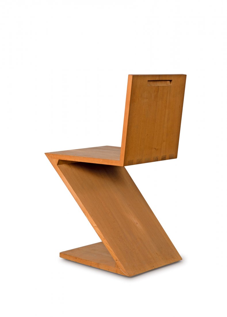 Gerrit Thomas Rietveld. 'Zig Zag' chair, 1934. H. 74 x: Gerrit Thomas Rietveld. 'Zig Zag' chair, 1934. H. 74 x 37.5 x 43 cm. Made by Meubelmakerij Adr. van Rietveld for Cassina, Milan. Elmwood. Marked: Maker's stamp, 1228.