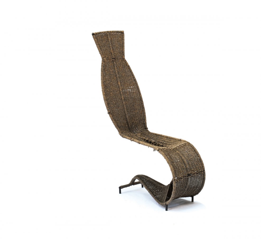 Tom Dixon. 'Bolide' chaise longue, 1988. H. 150 x 45 x: Tom Dixon. 'Bolide' chaise longue, 1988. H. 150 x 45 x 104 cm. Made by Dixon P.I.D., London. Welded steel and paper cord work, wicker cane.