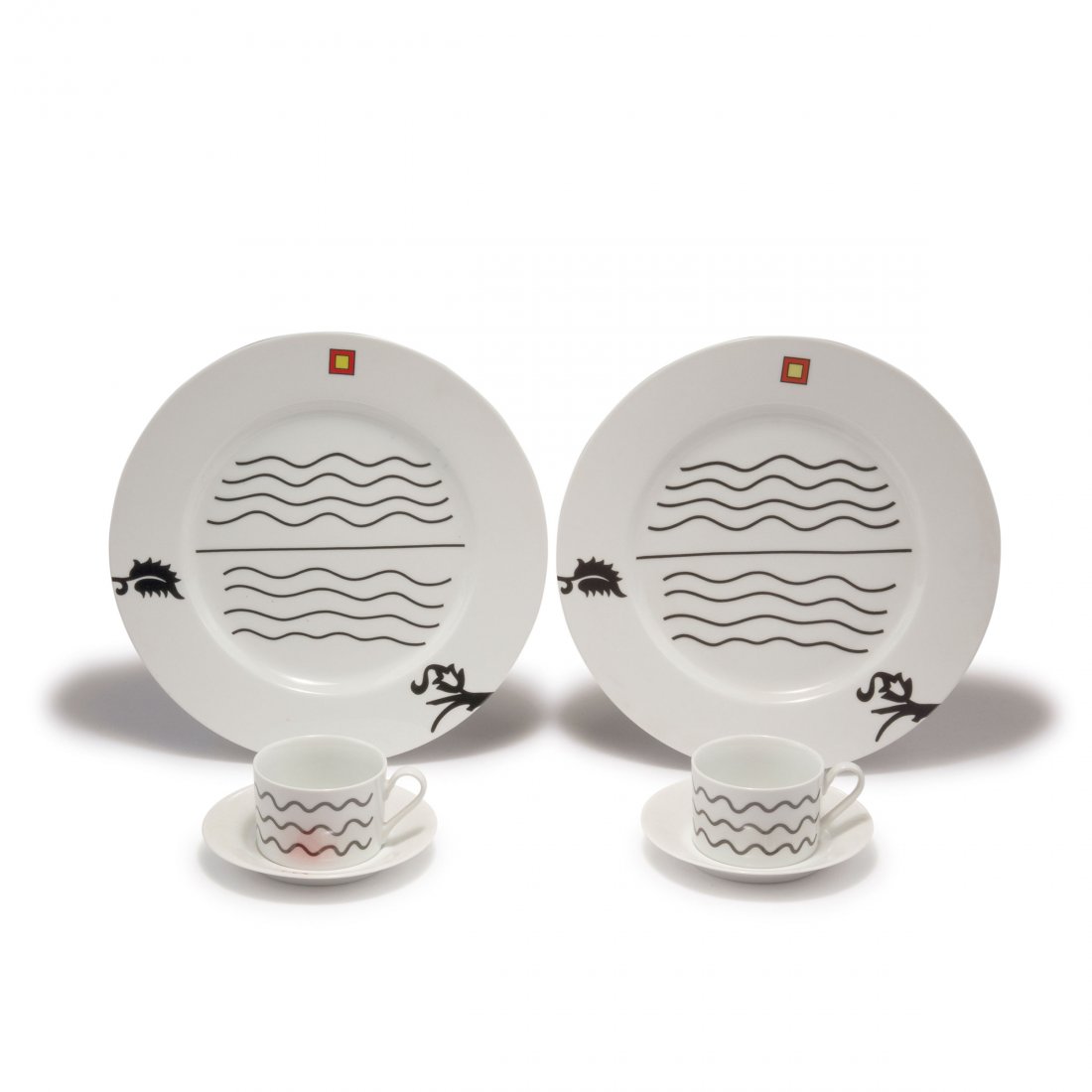Pair of 'Medici' place settings, 1985: Ettore Sottsass. Pair of 'Medici' place settings, 1985. Cups and saucers: H. 5.9 cm; plates: D. 30.6 cm. Made by Swid Powell, New York. Porcelain, white, glazed, pattern, yellow, red and black. Marked