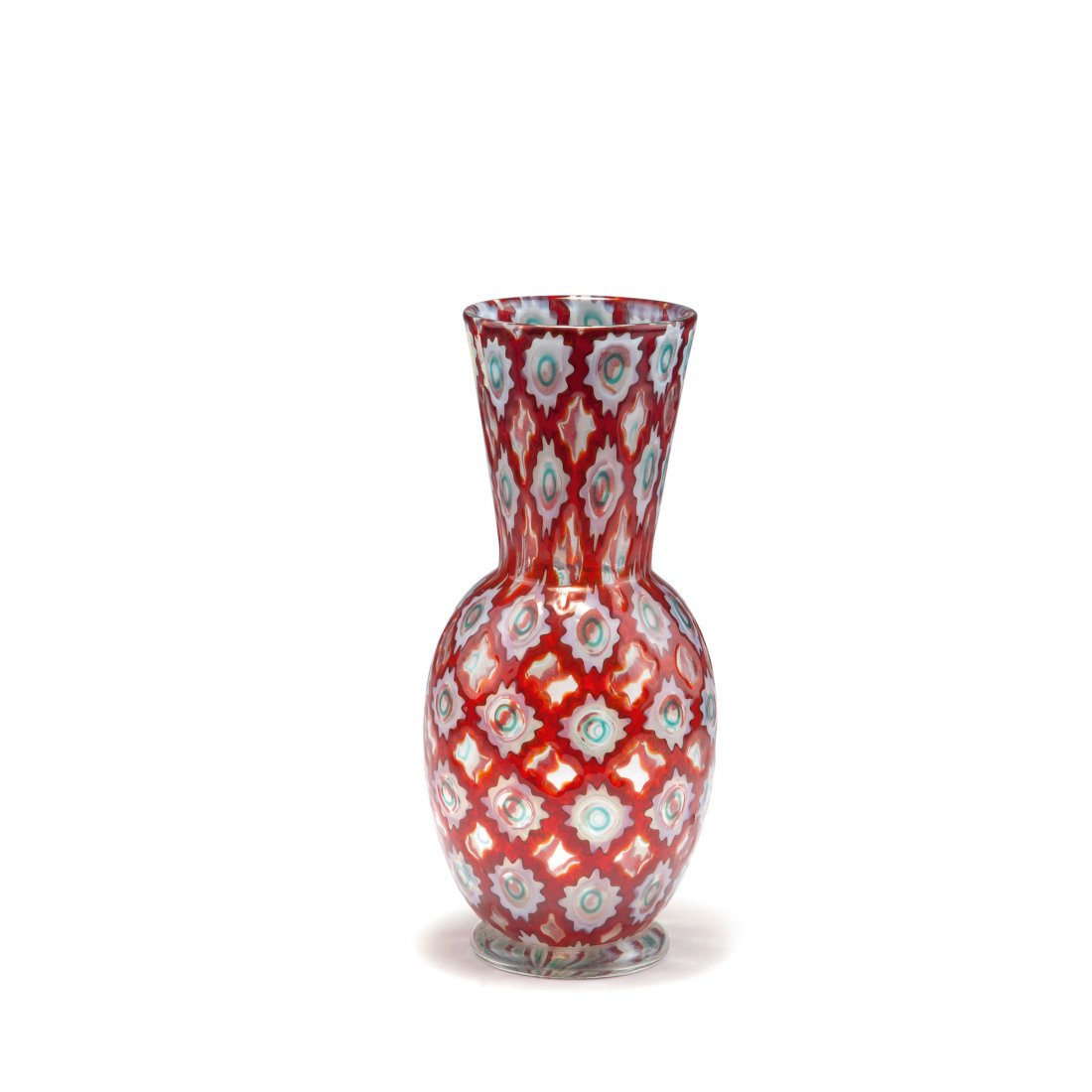 'Rotellato' vase, c1970: Ercole Barovier. 'Rotellato' vase, c1970. H. 30 cm. Clear glass, fused murrhines, ruby red, turquoise green and opal white glass, clear base. Marked: barovier & toso murano (engraved), remains of a pa