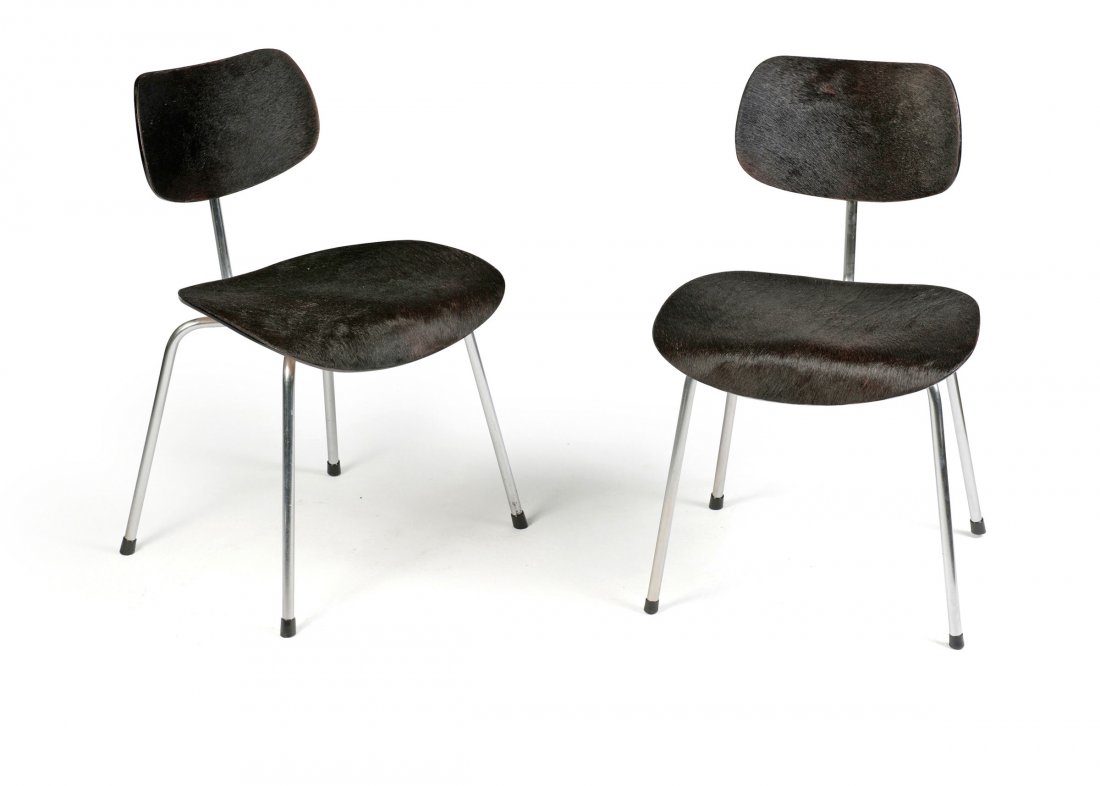 Pair of 'SE 68' chairs, 1951: Egon Eiermann. Pair of 'SE 68' chairs, 1951. H. 76.5 x 46.5 x 49 cm. Made by Wilde & Spieth, Esslingen. Chrome-plated tubular steel, plywood, painted black, black cow hide. Marked: 2.12.56.