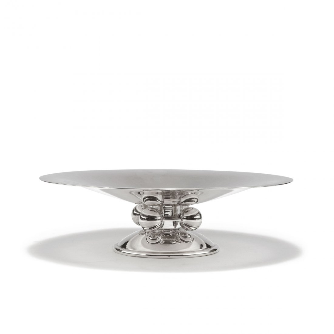 'Normandie' centrepiece, 1933: Luc Lanel. 'Normandie' centrepiece, 1933. H. 10 cm, D. 35 cm. Made by Christofle, Paris. Silver-plated alpacca. Marked: Scales, CHRISTOFLE, knight, 4, 0.